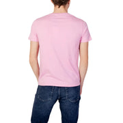 A soft pink short-sleeved cotton t-shirt with a crew neck and polka dot pattern by U.S. Polo Assn