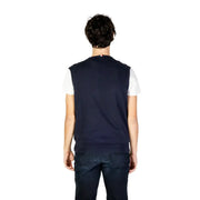 Navy blue knit vest with ribbed hem and collar over white t-shirt u.s. polo assn. men’s gilet at urban city styles