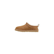 Tan suede ugg men slip on shoes with plush white shearling lining and rubber sole for spring summer use