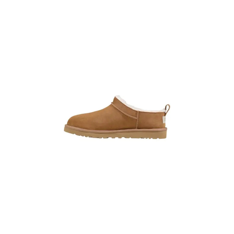 Tan suede ugg men slip on shoes with plush white shearling lining and rubber sole for spring summer use