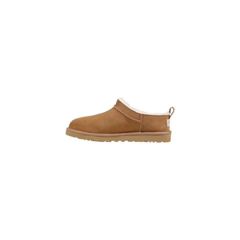 Tan suede ugg men slip on shoes with plush white shearling lining and rubber sole for spring summer use