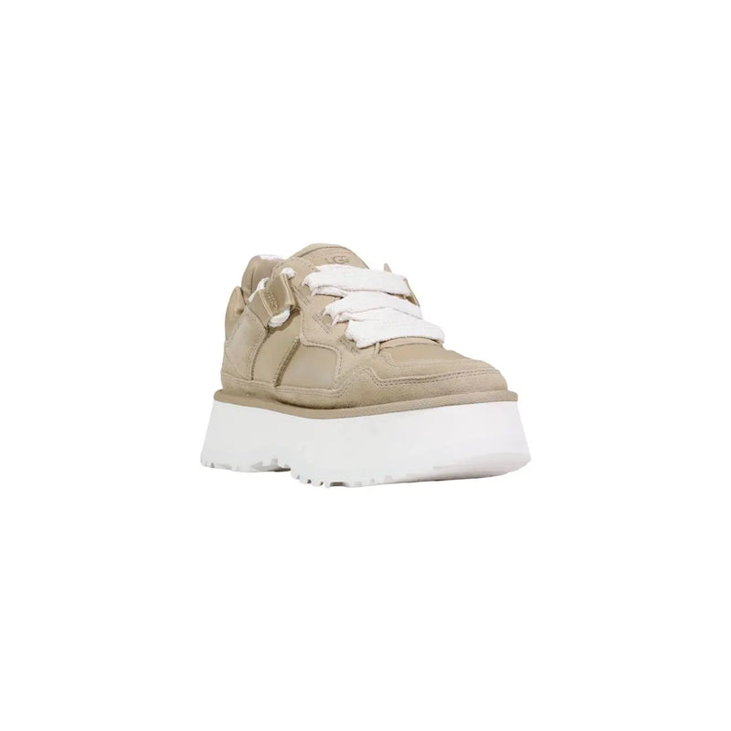 Ugg women beige leather platform boots featuring beige suede sneakers with white laces and chunky white soles