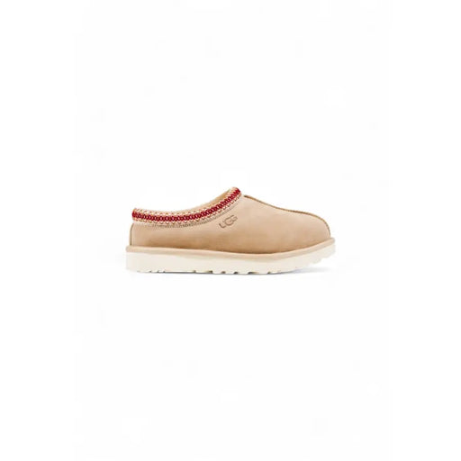 Ugg beige leather slip-on moccasin with red trim and white sole