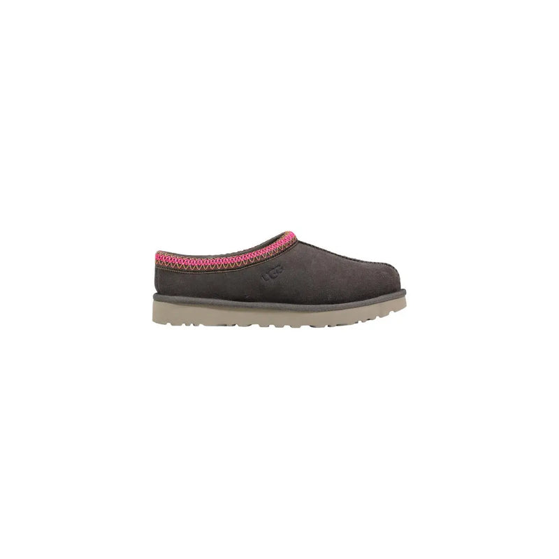 Dark gray suede Ugg women leather Tasman II slip-on slippers with vibrant pink woven trim along the opening