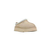Beige ugg women leather platform slippers with suede upper and white braided trim for spring wear