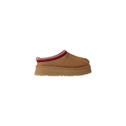 Ugg women beige suede platform slippers with tan color and red and white patterned trim visible from the back side