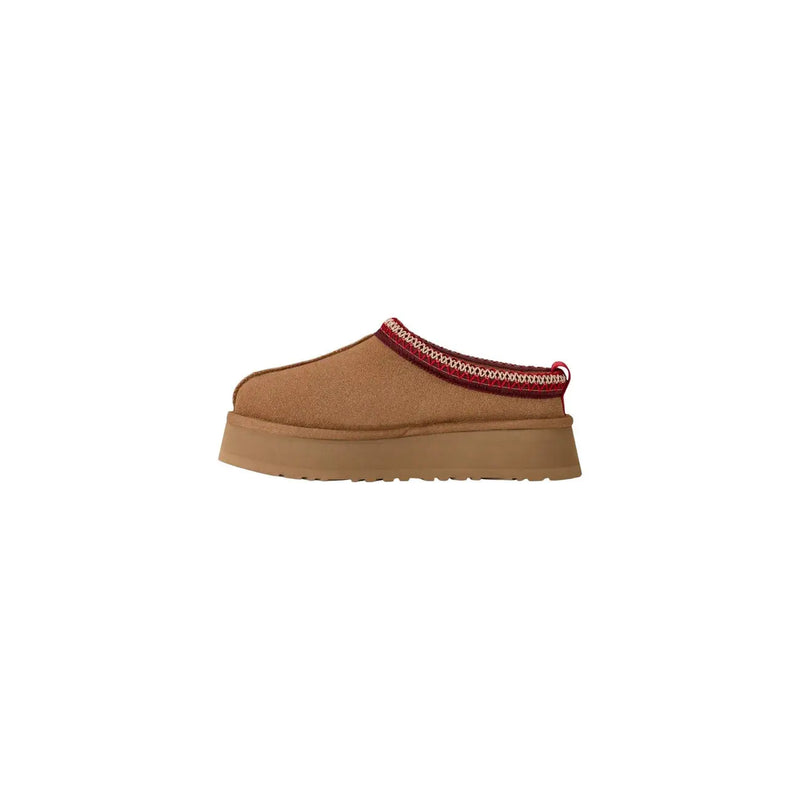 Ugg women beige suede platform slippers with tan slip-on mule design and red and white embroidered trim along opening
