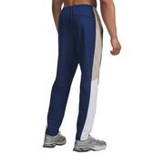Under Armour men blue polyester woven trousers in navy blue and beige with side panel design for athletic use