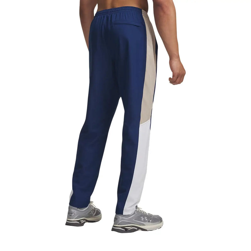 Under Armour men blue polyester woven trousers in navy blue and beige with side panel design for athletic use