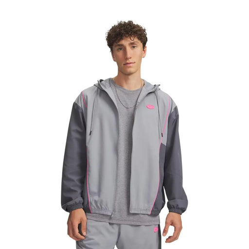 Under Armour Veste coupe-vent à capuche grise en polyester pour homme, avec un design bicolore et des liserés roses.