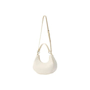 Valentino beige handbag with cream-colored crocodile texture shoulder bag featuring a sleek curved design and zip pocket