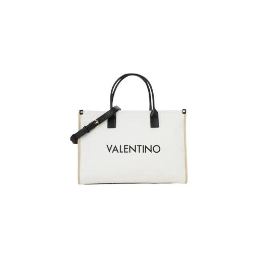 White Valentino tote bag with black leather handles and adjustable strap