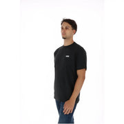 Vans men black cotton t shirt with short sleeves and a small white logo on the left chest