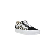 Black and white checkerboard Vans men leather sneakers with classic suede upper white laces and thick rubber sole