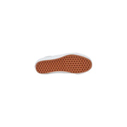White Vans slip-on sneaker with tan rubber sole showing iconic diamond tread pattern for men VN0A4BVB5OC1