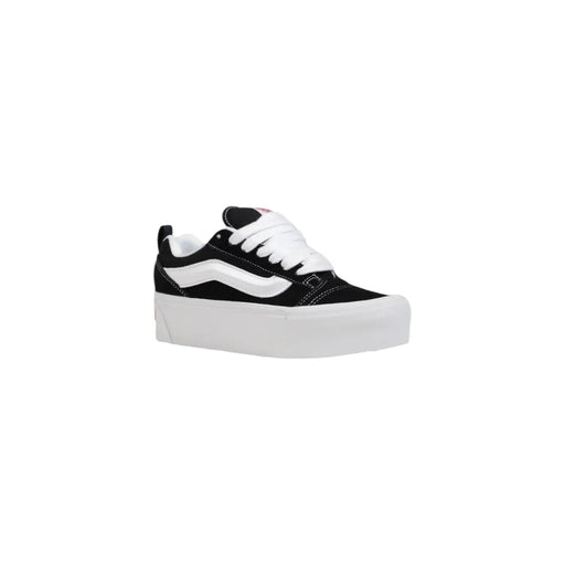 Schwarze Vans Damen-Sneaker aus Leder mit weißen Schnürsenkeln, einem charakteristischen Seitenstreifen und dicken weißen Gummisohlen