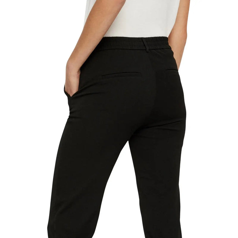 Vero Moda women black tailored trousers with sleek modern design and subtle back pockets shown from the back side