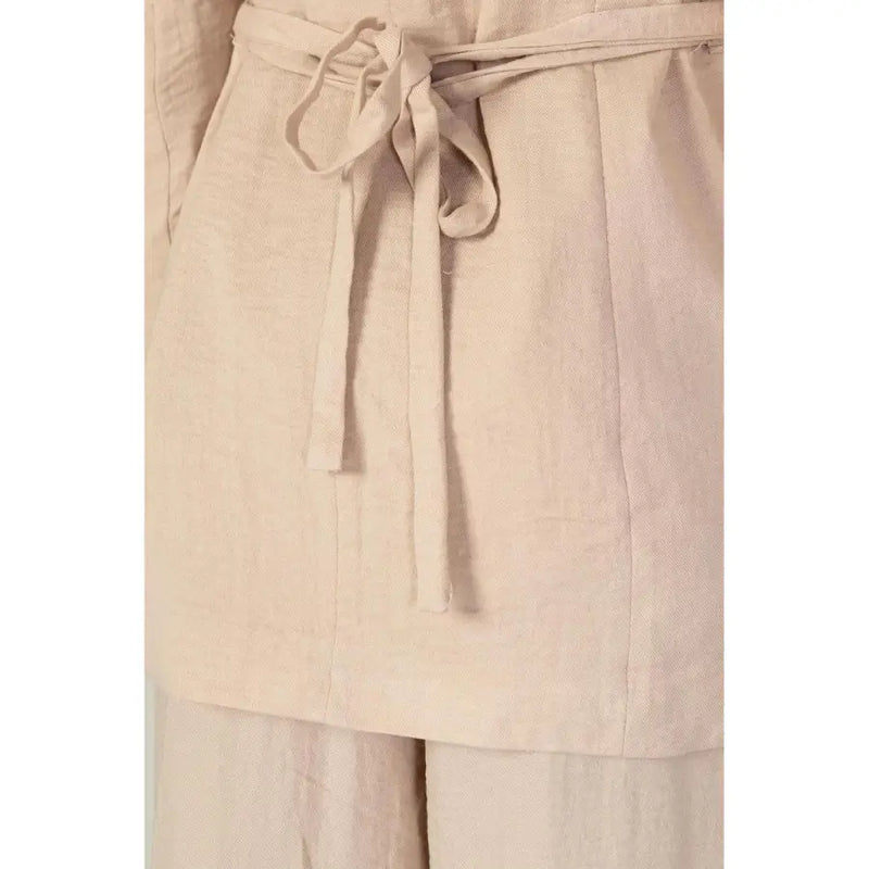 Beige linen belted dress with soft textured fabric and matching self-tie belt shown with vero moda pink blazer