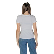 Back view of a gray t-shirt paired with blue jeans showcasing Calvin Klein Jeans design