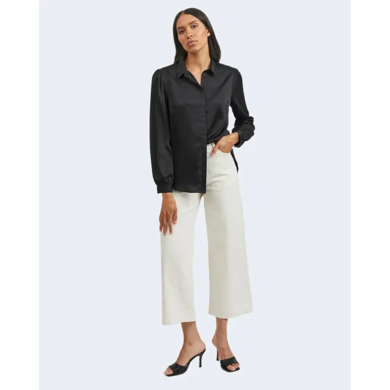 Black satin blouse with long sleeves polyester fabric button-down front and lapel collar by Vila