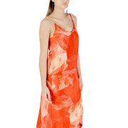 A sleeveless vila clothes women tank top in flowing orange and peach brushstroke pattern made of viscose blend