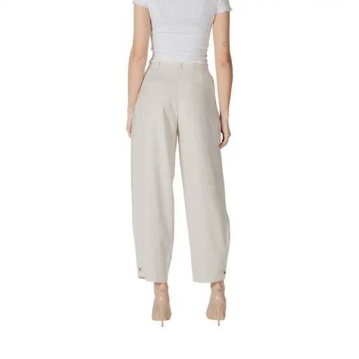 Beige high-waisted wide-leg trousers with tailored fit and subtle side pockets from vila clothes white collection