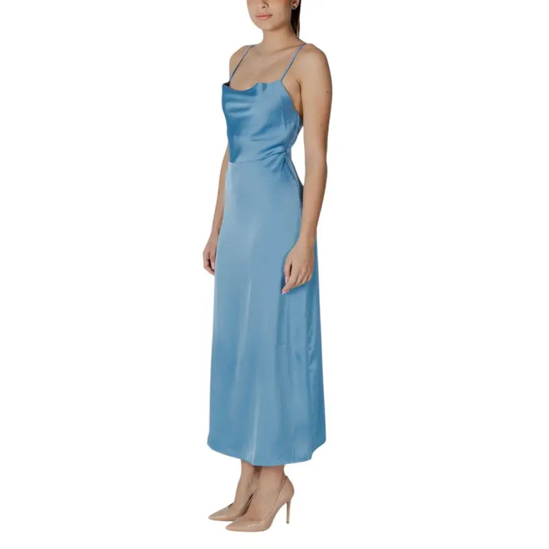 A sleek light blue polyester Vila turquoise dress with thin spaghetti straps and a gathered waistline