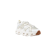 White athletic slip-on sneakers with chunky perforated sole and brown heel accent