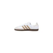 White and brown Adidas Samba sneakers displayed in the Adidas Samba Sneakers in White and Tan product