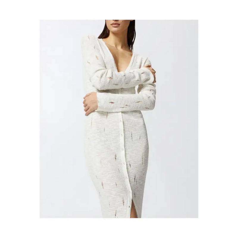 A white cotton knit dress by Pinko with a deep v neckline and front button closure