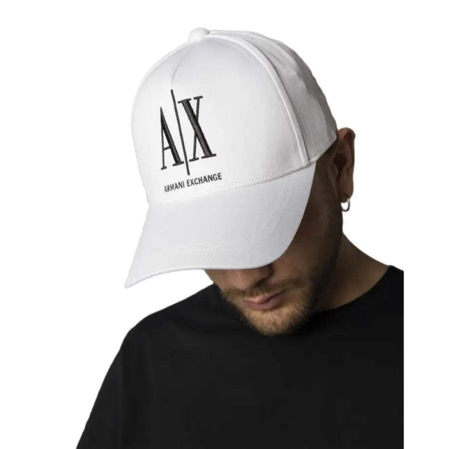 
                      
                        Armani Exchange men cap for spring summer, featuring white hat with black logo.
                      
                    