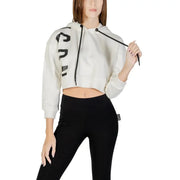 Cream-colored cropped cotton blend hoodie for women with bold black vertical sleeve lettering and matching black drawstrings