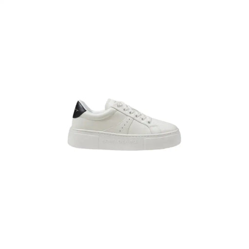 White leather sneaker with black heel accent for stylish casual footwear