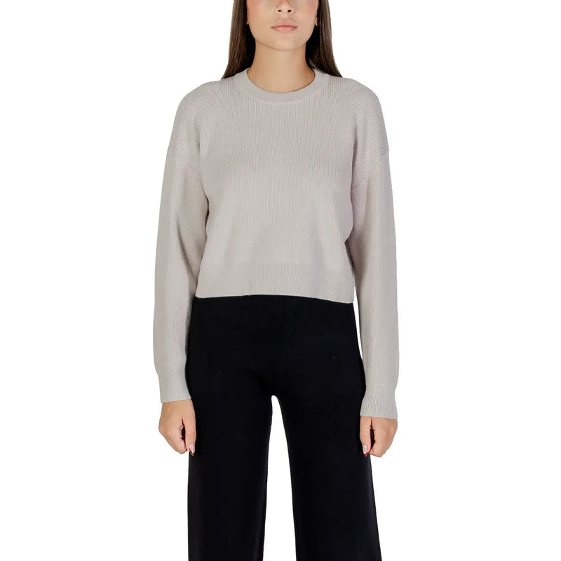 Weißer, langärmeliger Strickpullover mit Rundhalsausschnitt für Damen aus weichem, geripptem, beigefarbenem Strick mit lockerer Passform und langen Ärmeln