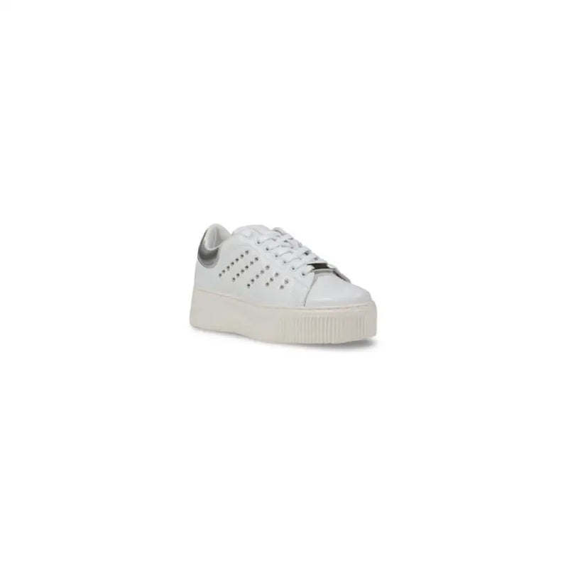 White studded platform sneaker displayed on a product page