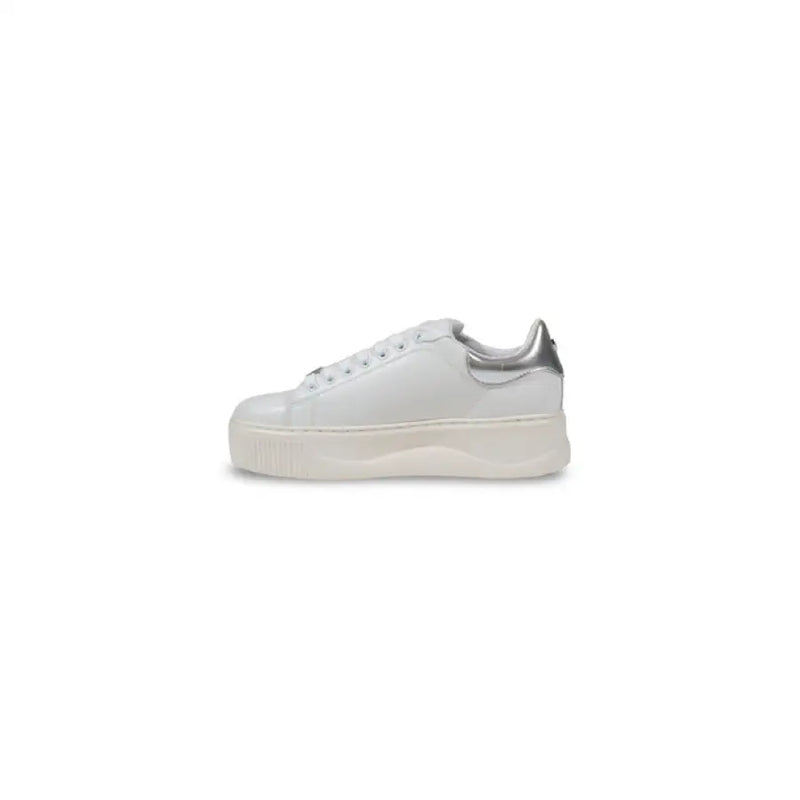 White platform sneaker with silver accents from the White Studded Platform Sneaker collection