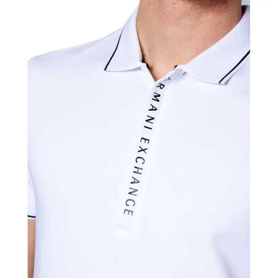 
                      
                        Armani Exchange Men Polo in white featuring ’person’ text, urban style clothing
                      
                    