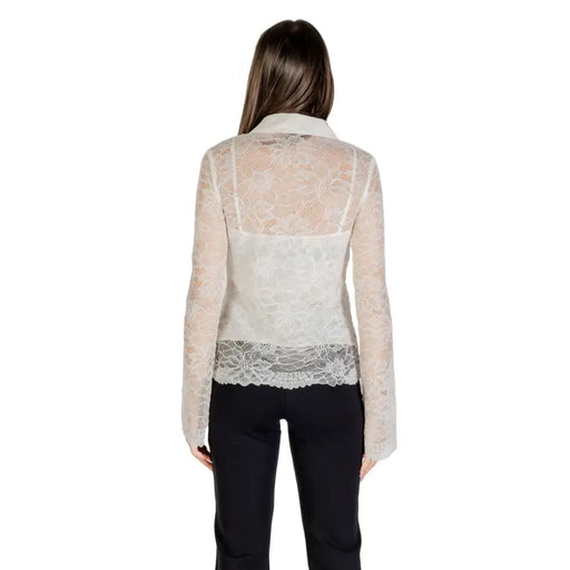 White sheer long-sleeve lace top over camisole in Guess Classic Beige Buttoned Long Sleeve Shirt