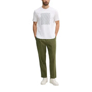 White short sleeve t shirt with a gray monogram pattern across the chest made of soft breathable fabric