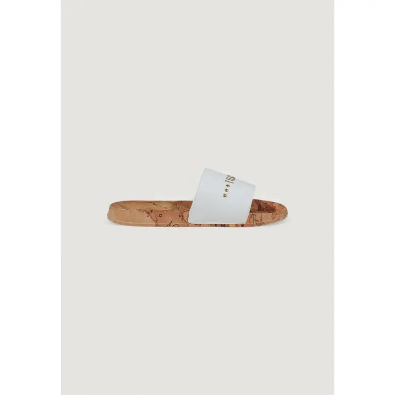 White slide sandal with a cork sole featuring white leather and a subtle map print on the sole