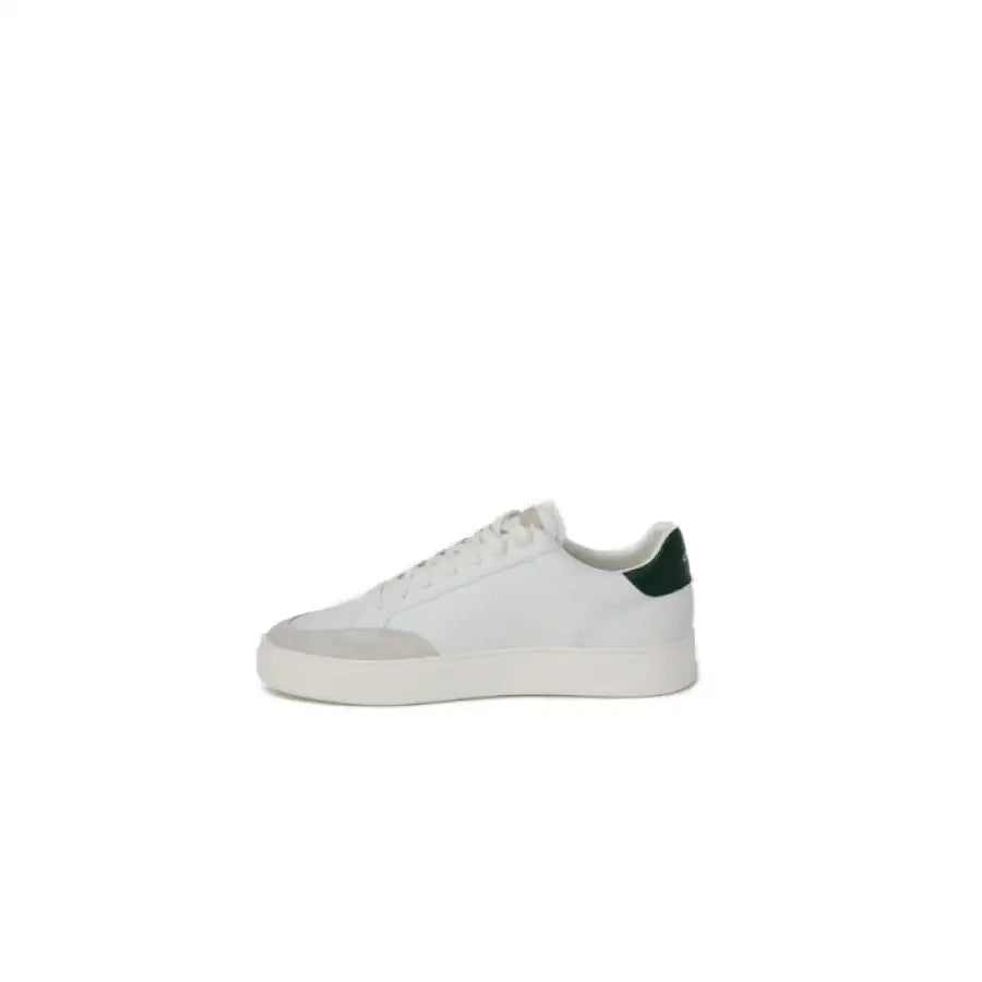 
                      
                        Crime London men sneakers in white with green trim, embodying urban city fashion
                      
                    