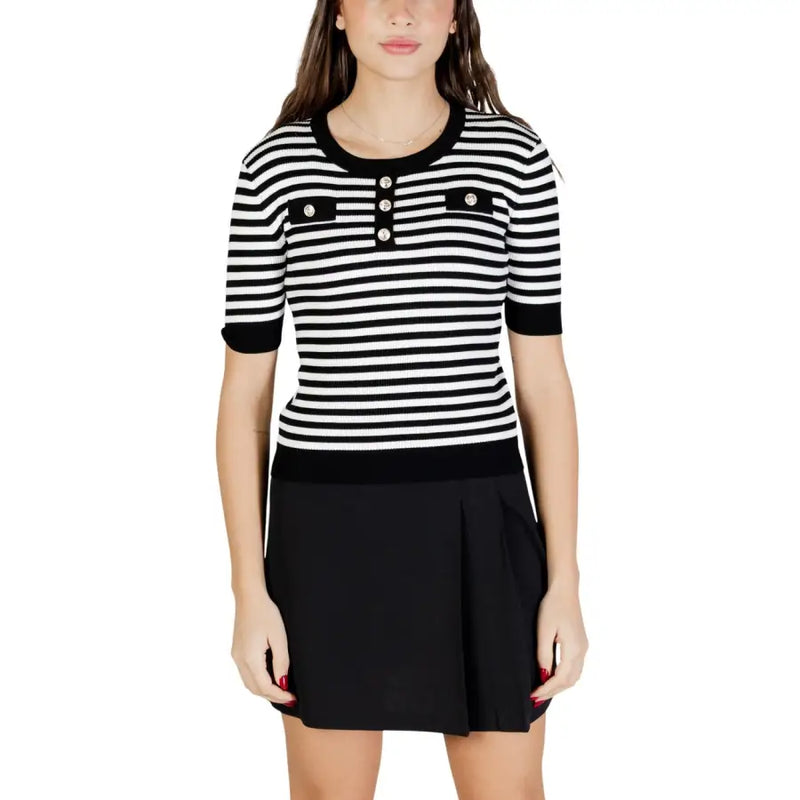 White striped short sleeve round neck knit top with black and white stripes button details and ribbed cuffs
