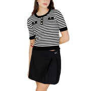 Black and white striped short-sleeved knit top with button details featuring a round neck design