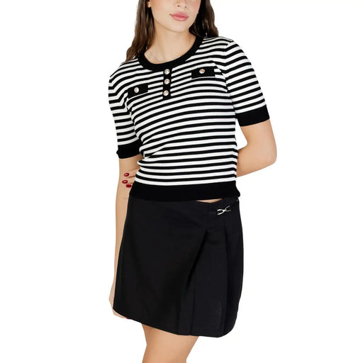 Black and white striped short-sleeved knit top with button details featuring a round neck design