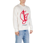 White tommy jeans sweater featuring a bold red embroidered logo with the brand name in black lettering below