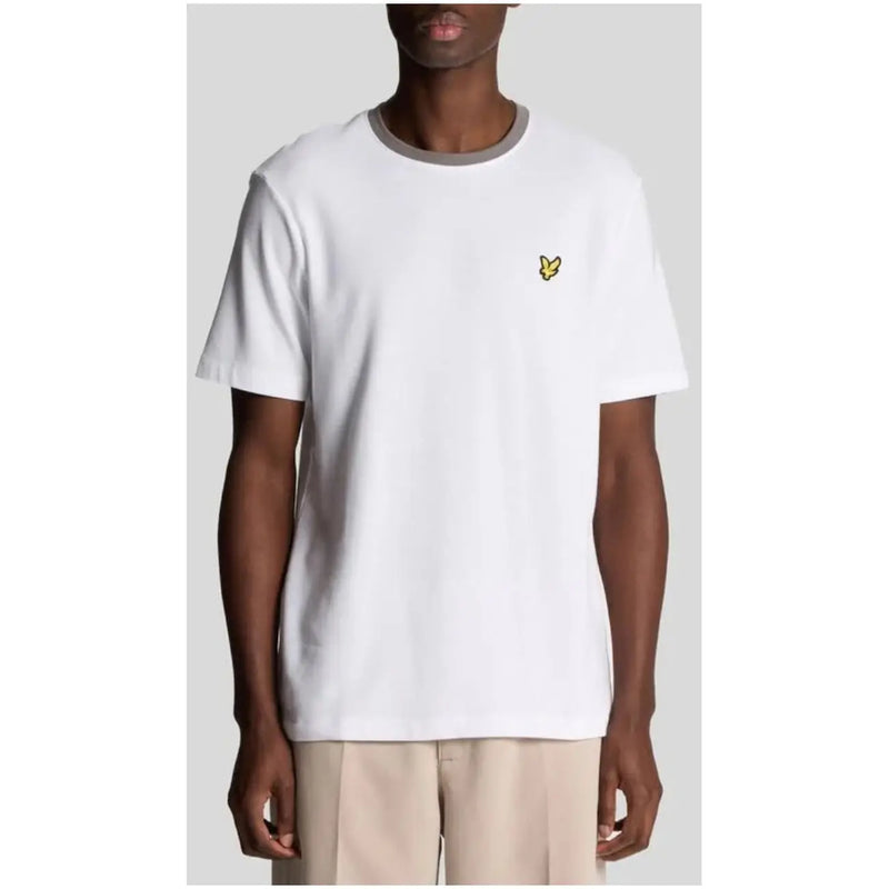 White short-sleeved t shirt with gray ribbed crew neck and small yellow embroidered bird logo on left chest