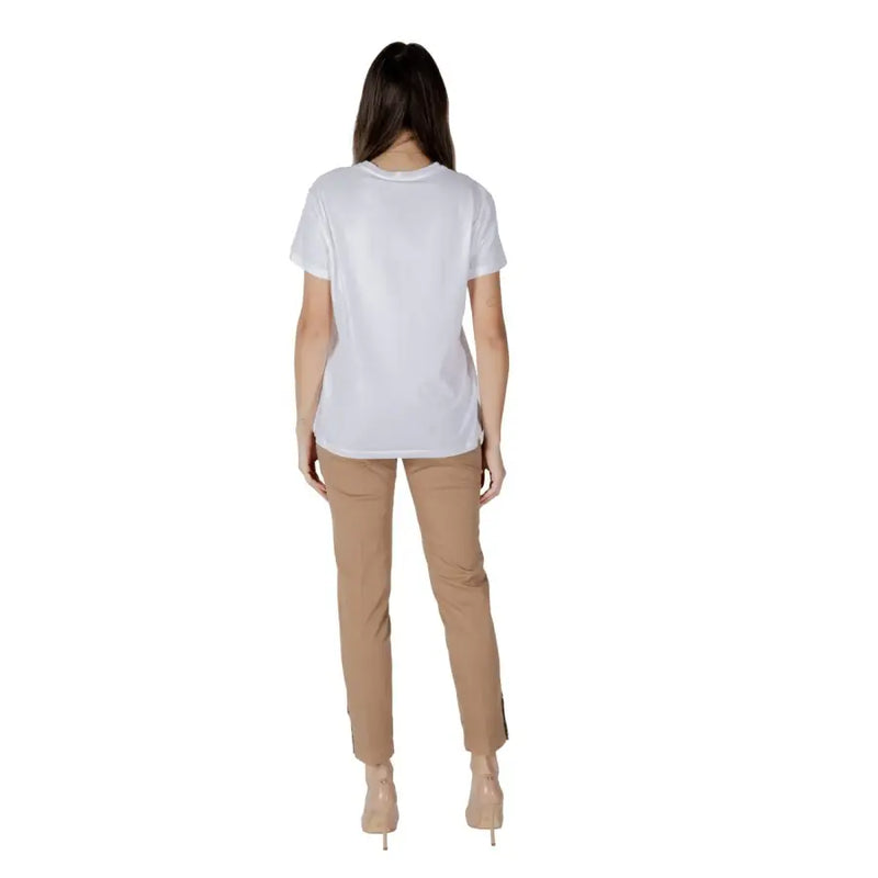 White short-sleeved t-shirt with scooter graphic, simple round neckline, and relaxed fit in soft cotton material