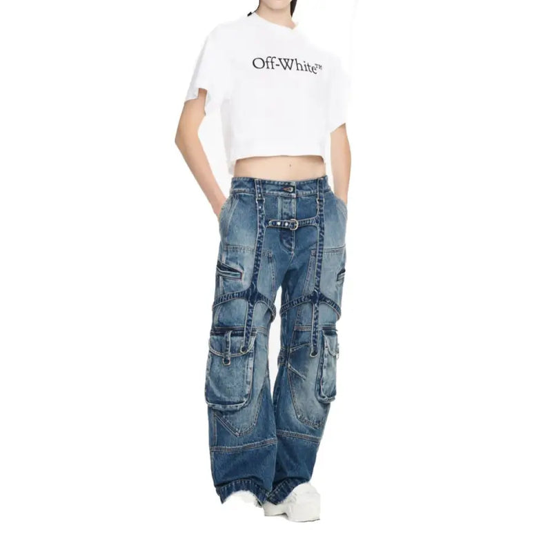 Off white women cotton jeans in blue denim with multiple cargo pockets belt buckle detail zip fly and distressed finish