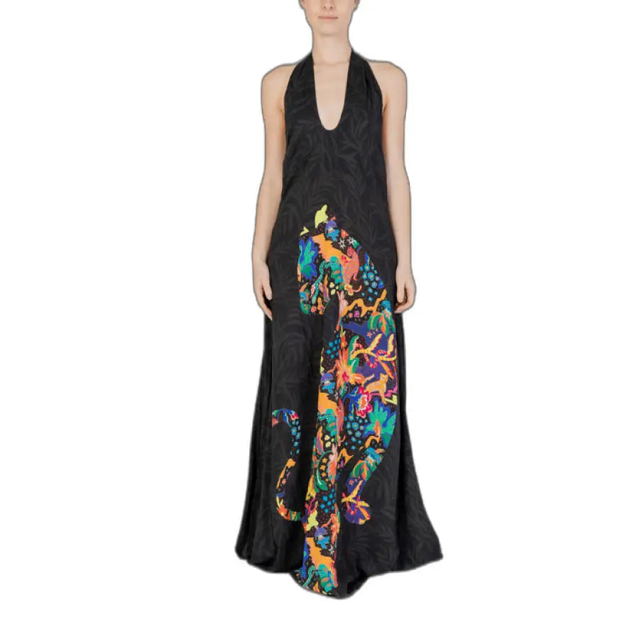 Woman in Desigual urban style black dress with colorful floral print