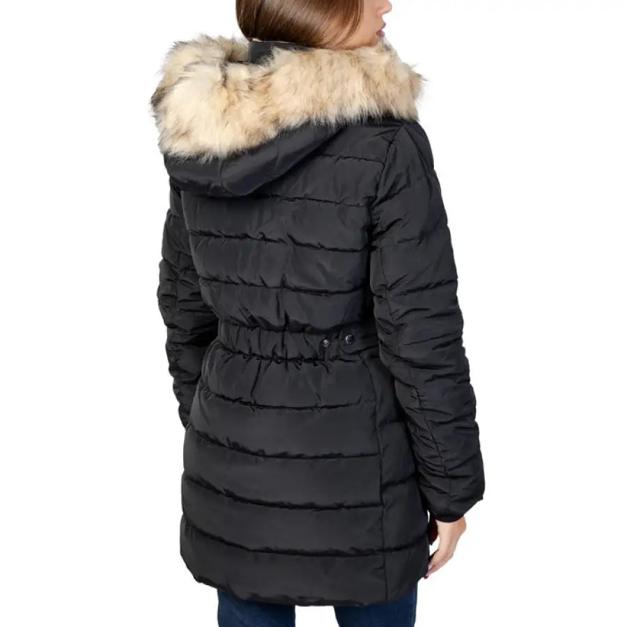 Woman in Only black jacket with fur collar, fall winter women type jackets season